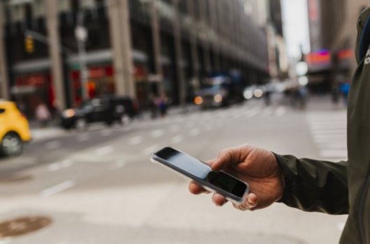 Person holding a cell phone
